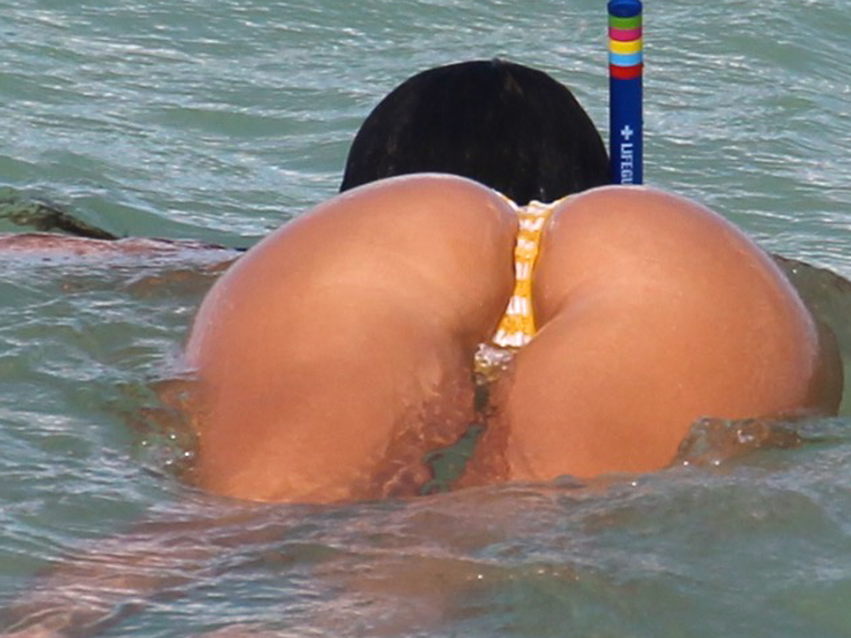 claudia-romani-in-a-yellow-thong-bikini-at-the-beach-in-miami-3.jpg