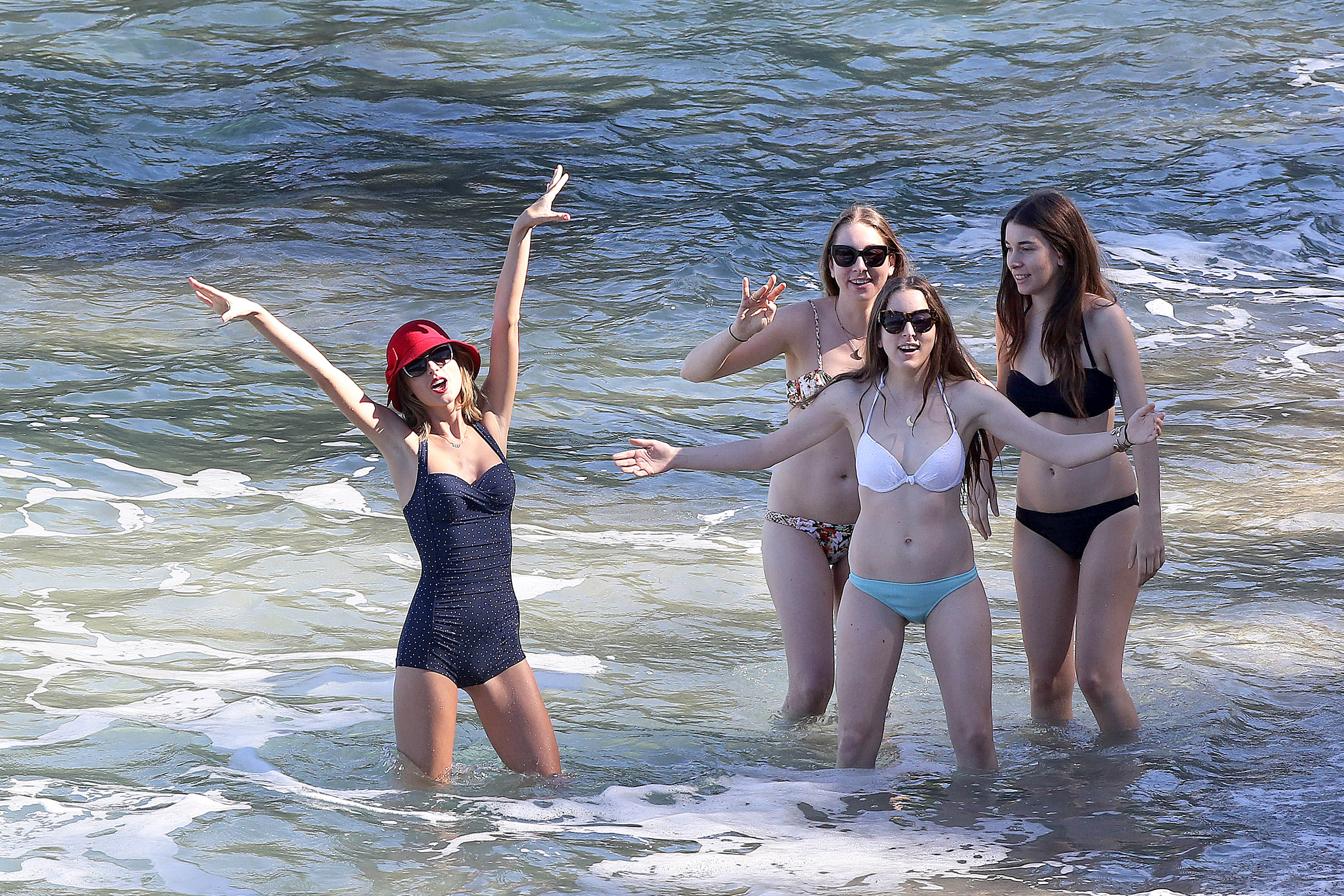 https://celebrityslips.com/wp-content/uploads/2015/01/taylor-swift-bathing-suit-and-her-friends-at-the-beach-3.jpg