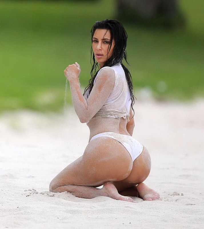 kim-kardashian-wet-shirt-bikini-on-a-beach-in-mexico-24